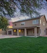 Queen Creek backyard after renovation, with fresh green sod and open space