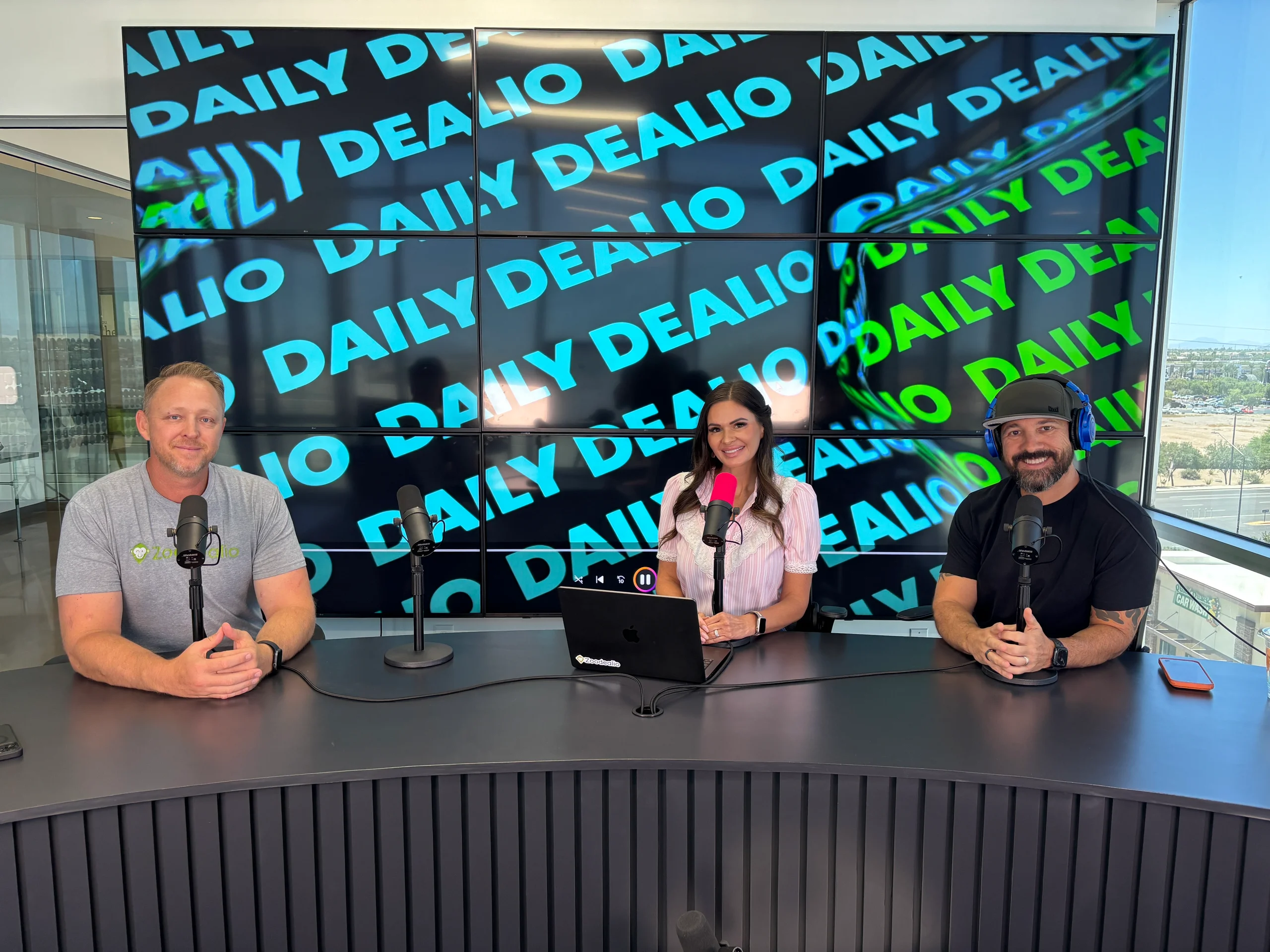 The Daily Dealio hosts at the studio desk